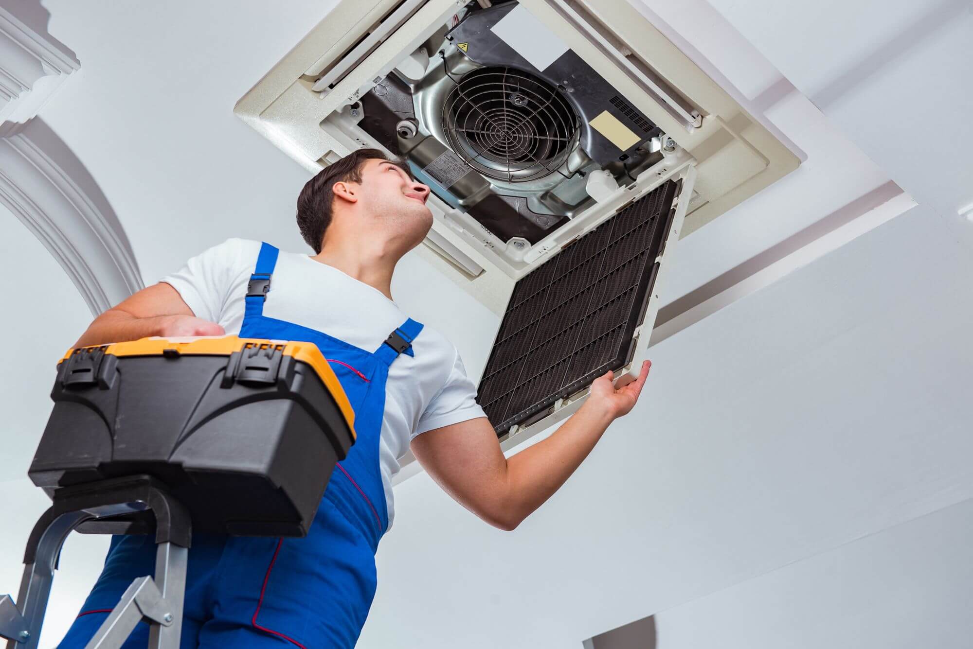 Commercial HVAC cleaning of rooftop ductwork on a commercial property